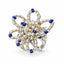 Aster — blue sculptural beaded ring by ArtsWeave, isolated on a white background