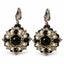 Noctelle — black beaded medallion earrings by ArtsWeave, isolated on a white background
