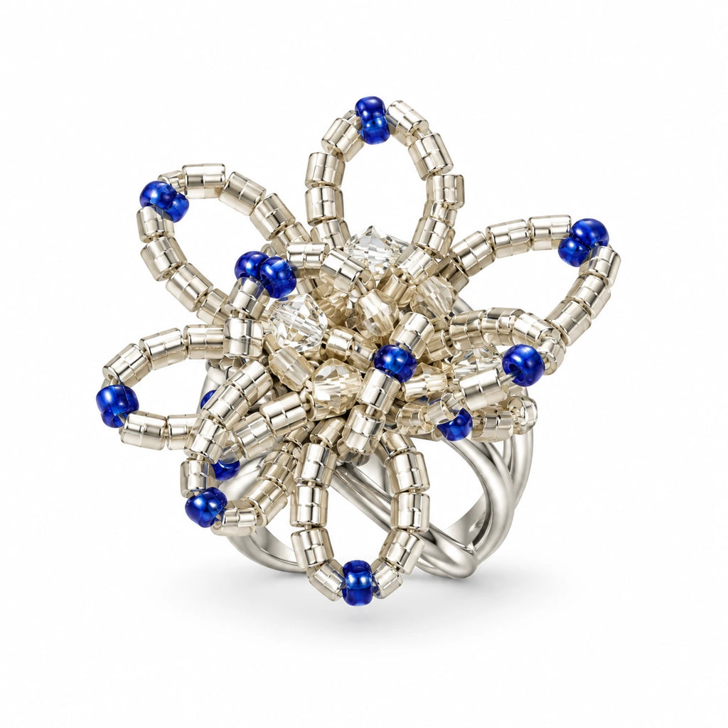 Aster — blue sculptural beaded ring by ArtsWeave, isolated on a white background