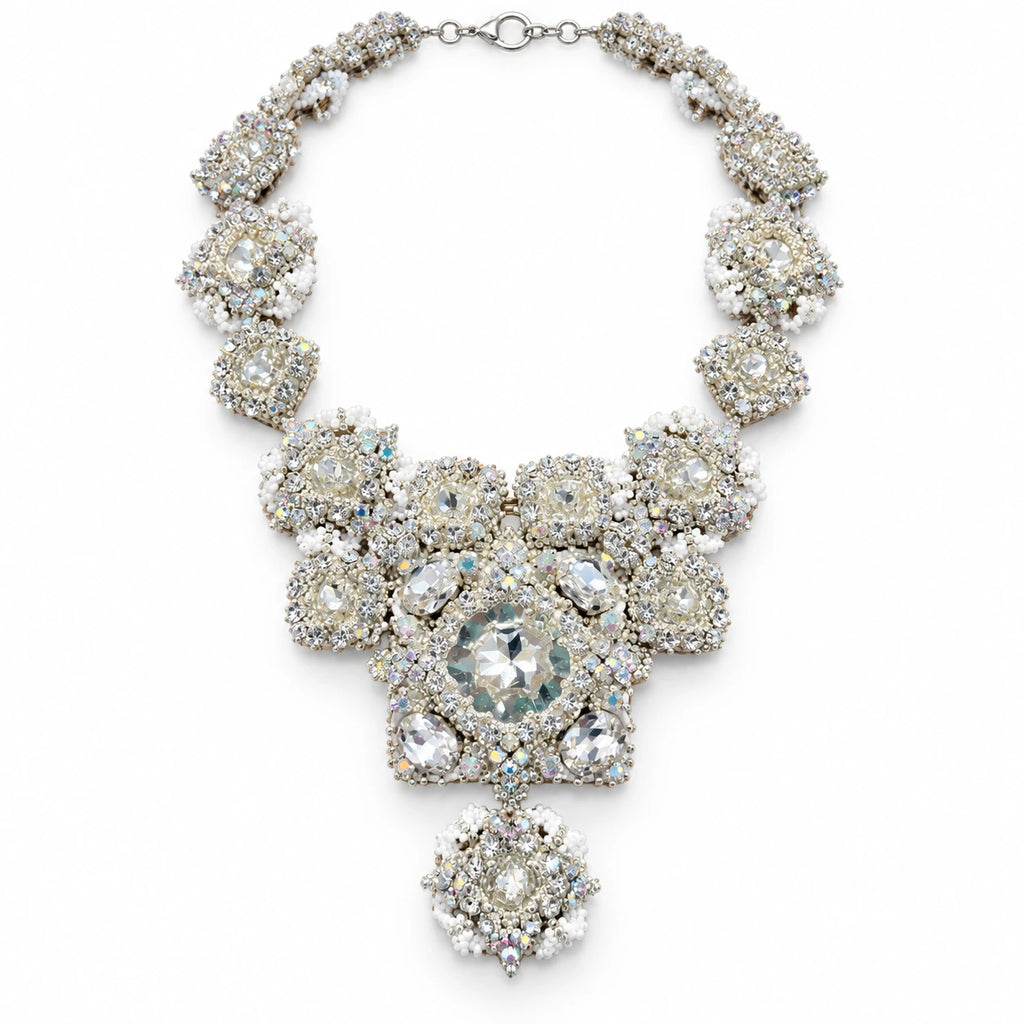 Eclat — clear statement bib necklace by ArtsWeave, isolated on a white background