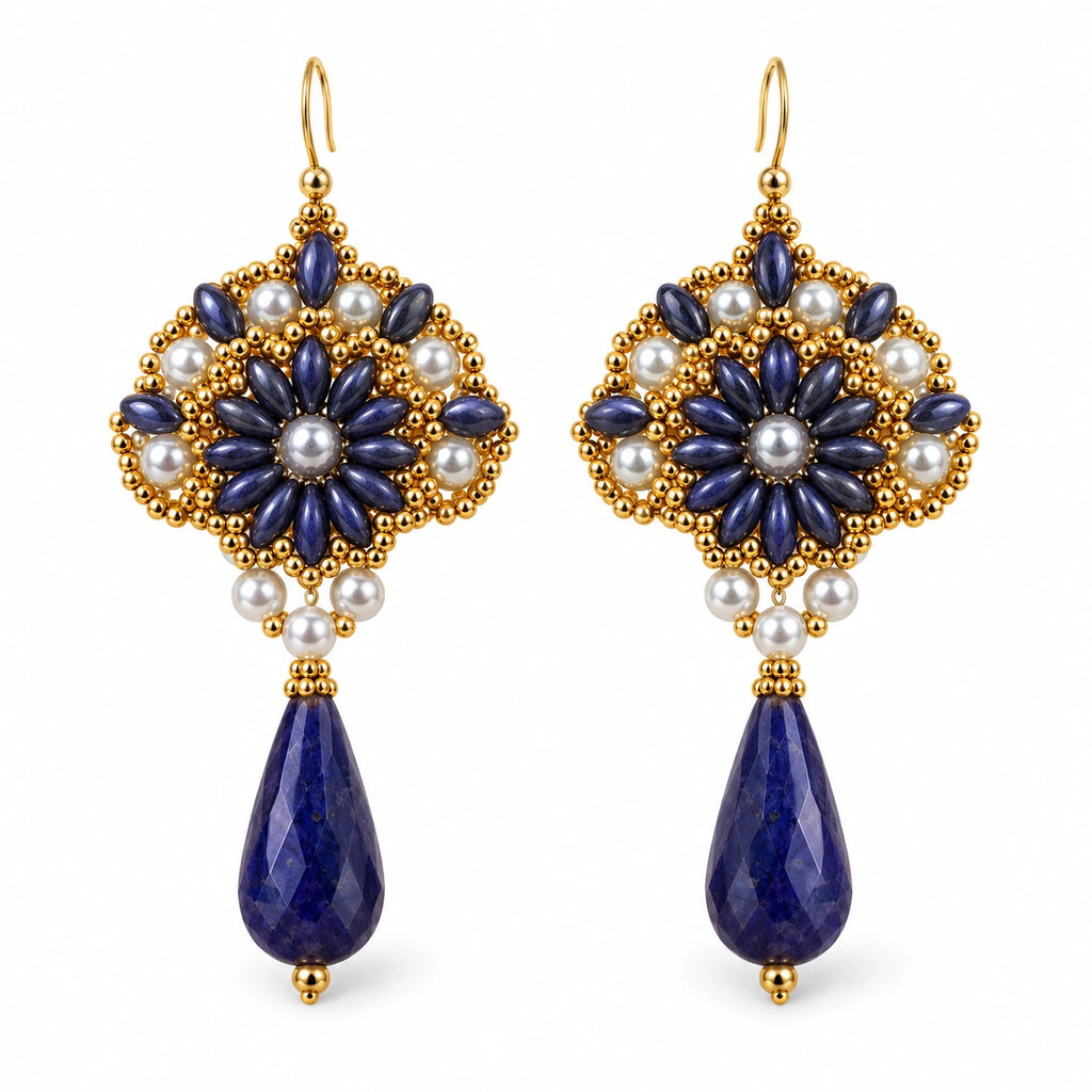 Nyelle — midnight blue floral drop earrings by ArtsWeave, isolated on a white background