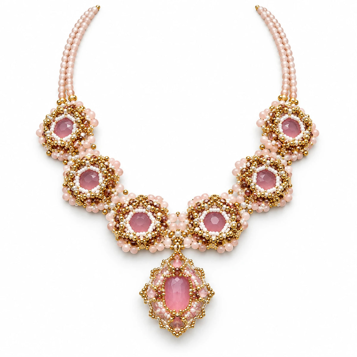 Rosera — pink floral medallion necklace by ArtsWeave, isolated on a white background Main image