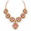 Rosera — pink floral medallion necklace by ArtsWeave, isolated on a white background