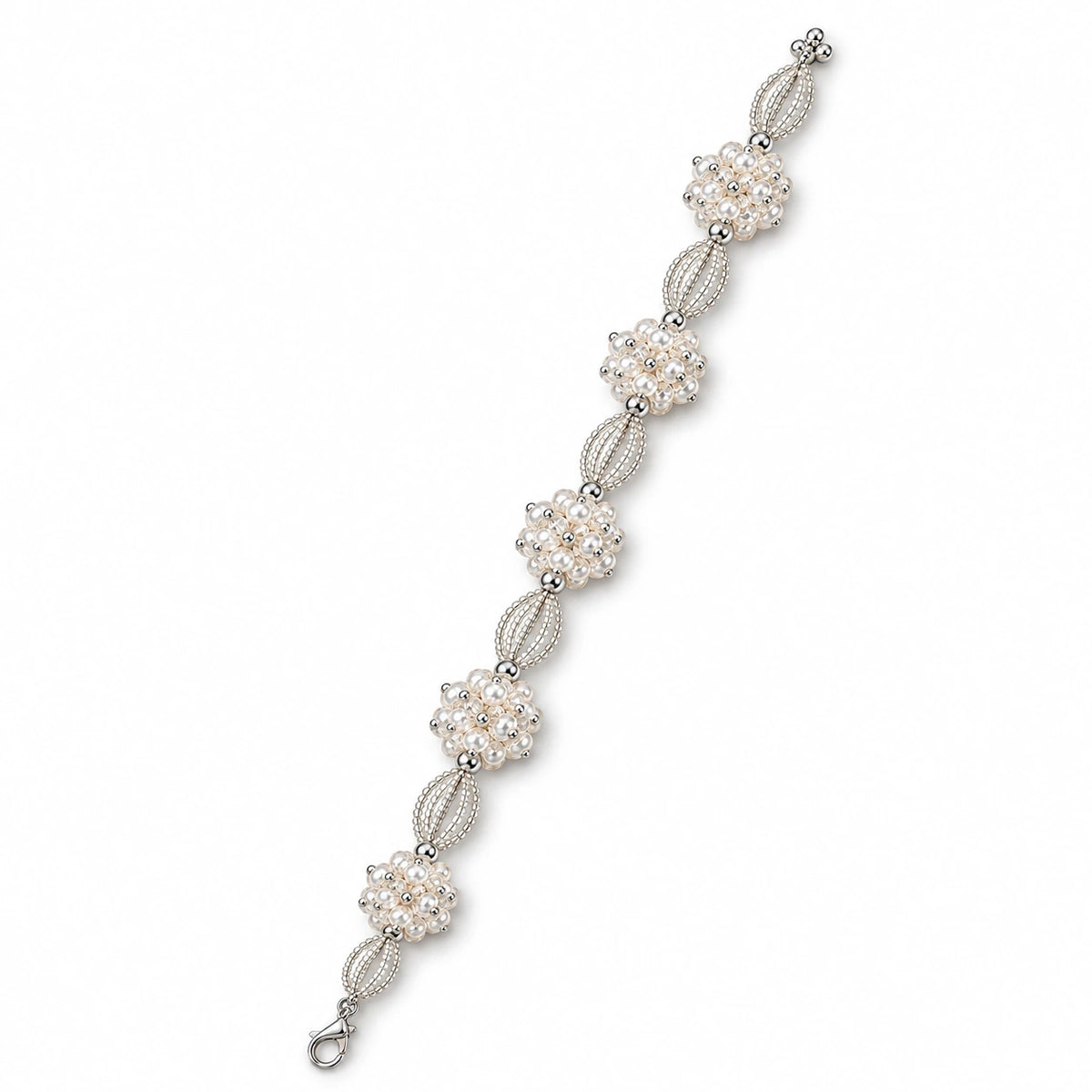 Sylphe — silver-tone floral beaded bracelet by ArtsWeave, isolated on a white background
