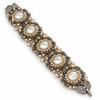 Tenebra — dark floral medallion bracelet by ArtsWeave, isolated on a white background