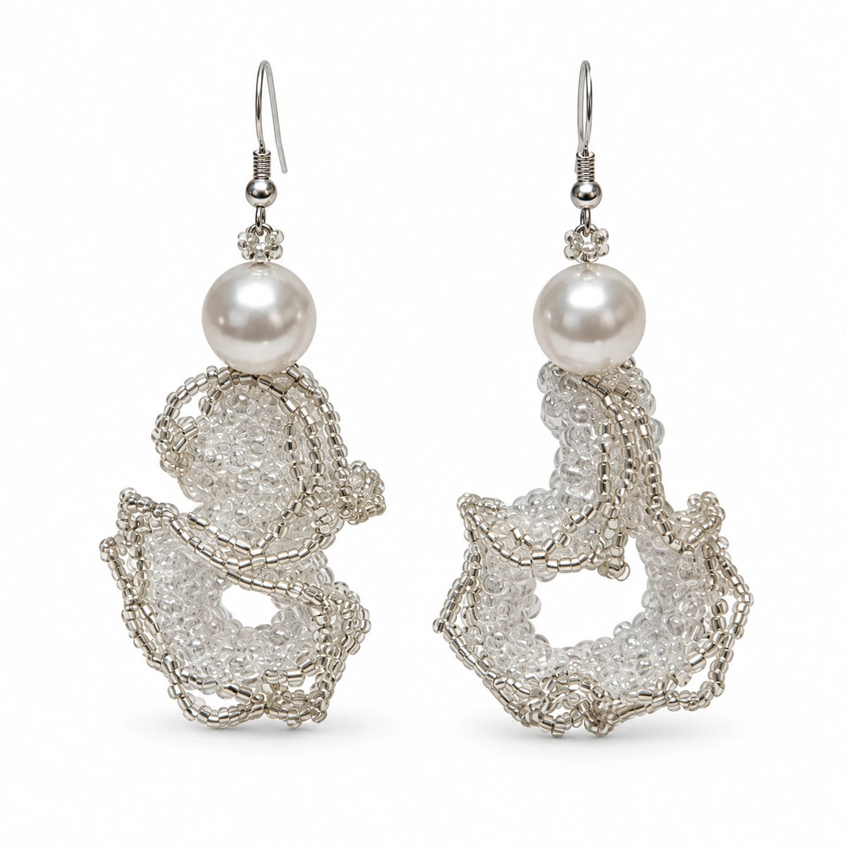 Undine — silver-tone sculptural drop earrings by ArtsWeave, isolated on a white background